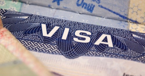What are a US citizen’s tax duties if UK freelancing on a partner’s visa?